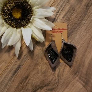 Soft grey leather with black sparkle